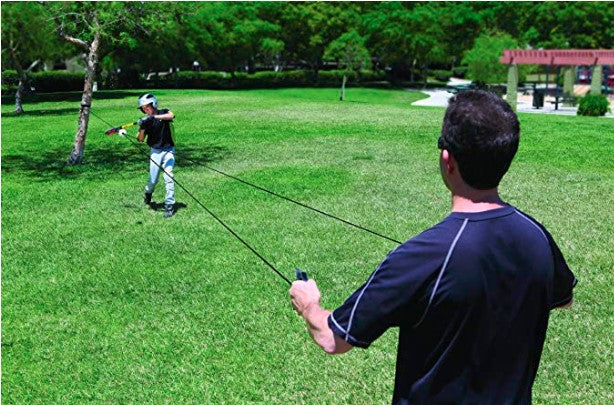 Baseball swing practice with Zip-Line hitting trainer